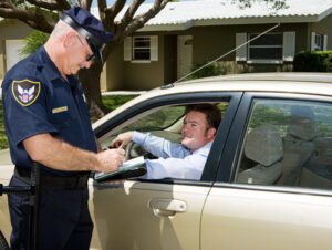 police giving man a traffic ticket